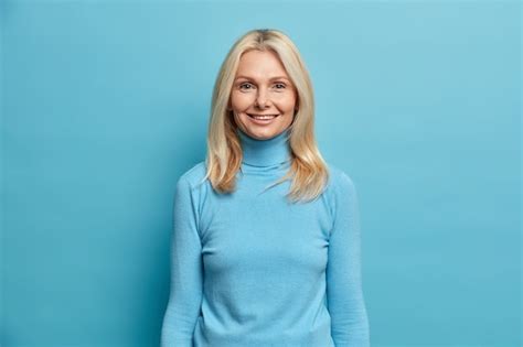 Free Photo Portrait Of Charming Middle Aged Attractive Woman With Blonde Hair