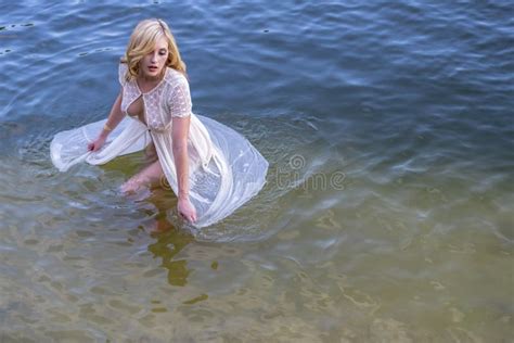 A Lovely Blonde Model Enjoys A Day At The Lake Stock Image Image Of