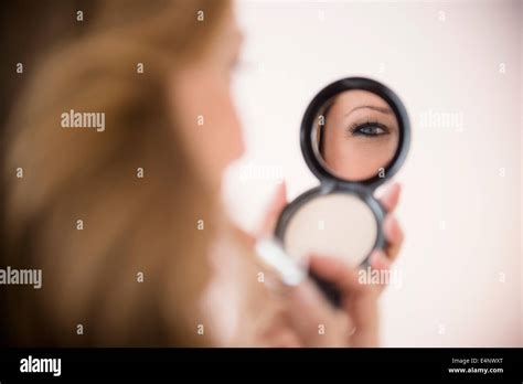 Mature Blonde Woman Applying Hi Res Stock Photography And Images Alamy