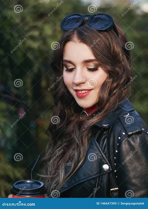 Closeup Portrait Of Young Brown Haired Curly Woman With Trendy Creative