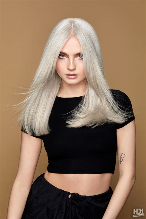 Long Pearl Blonde Hair With A Centre Parting