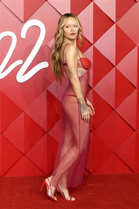Rita Ora Dons Naked Dress And Prosthetics At Fashion Awards