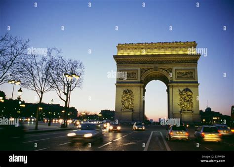 Arc Du Triomphe At Dusk With Traffic Paris Stock Photo Alamy