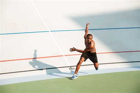 Free Photo Full Length Portrait Of A Half Naked Concentrated Sportsman