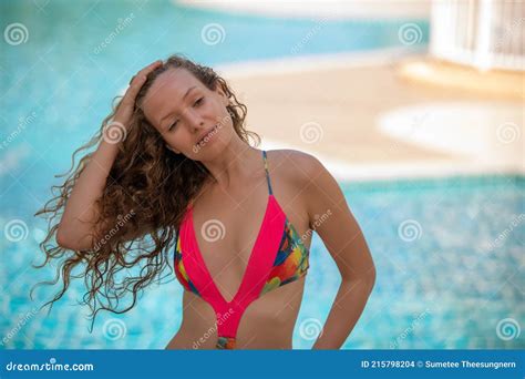 Women Wear Bikini For Swimming At The Summer Recreation Pool Stock