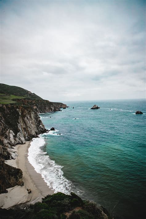 Photo Of A Cliff Near Sea · Free Stock Photo