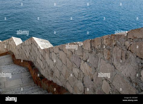 Steps Leading Down To The Sea On The Old City Wall Of Dubrovnik