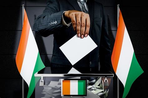 Premium Photo Cote D Ivoire Flags Hand Dropping Voting Card Election