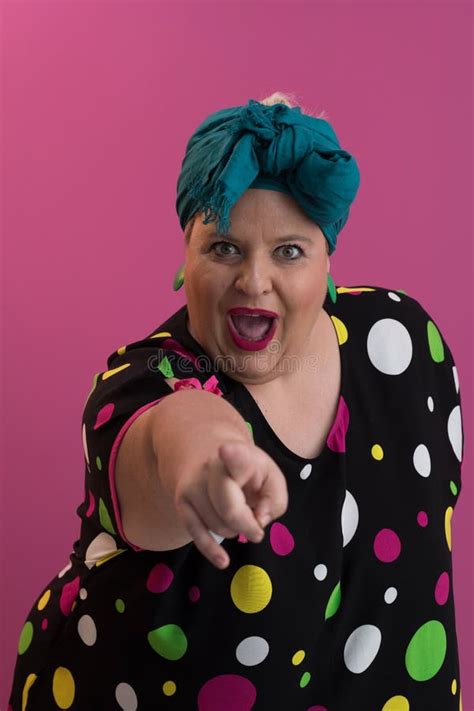 Plus Size Model Woman With Trendy Makeup Fashionable Blonde In Black Short Dress Posing At The