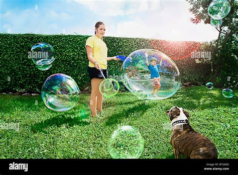 Teenage Girl Making Giant Bubble Hi Res Stock Photography And Images