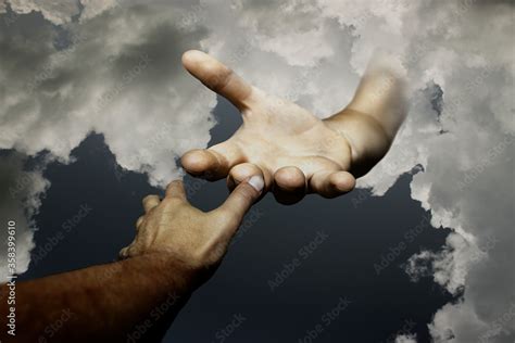 god hand  reaching man hand christian concept stock photo adobe stock