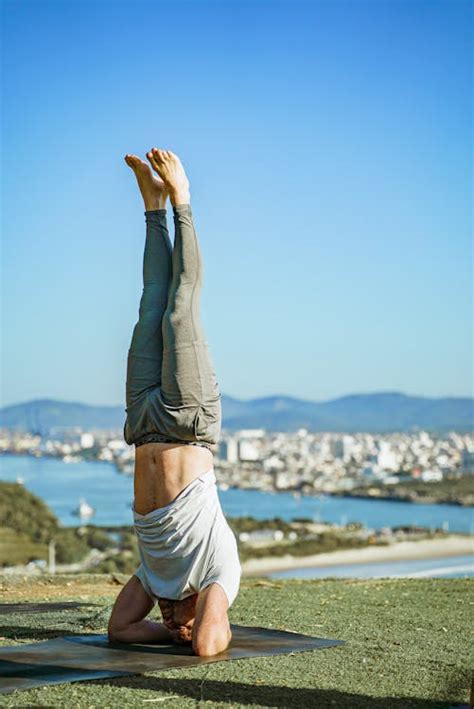 Man During Yoga Headstand · Free Stock Photo