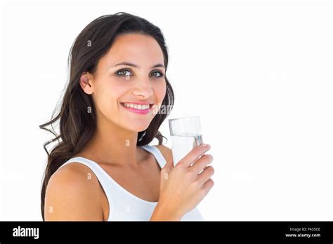 Pretty Brunette Drinking Glass Of Water Stock Photo Alamy