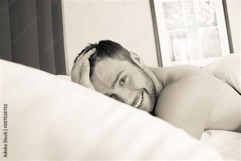Shirtless Sexy Hunky Man With Beard Lies Naked In Bed Stock Photo Adobe Stock