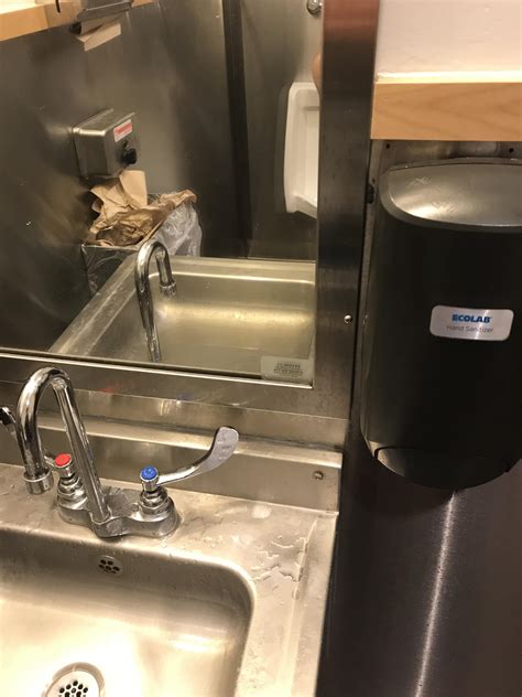Hand Sanitizer To The Right Of The Sink Actual Soap Behind The Sink