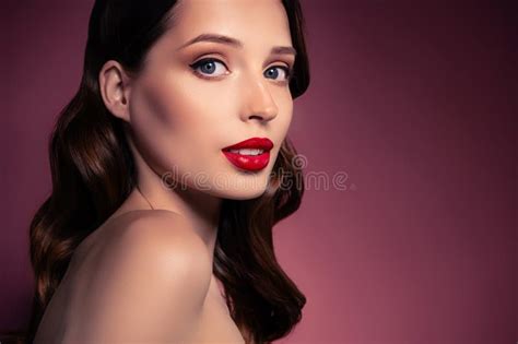 Photo Of Brunette Wavy Curly Haired Lady With Decorative Make Up Look In Camera Isolated Empty