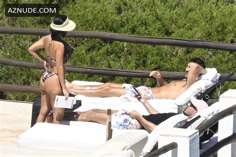 Kourtney Kardashian Enjoys Bikini Fun In Candid Snaps While Vacationing With Friends Off The