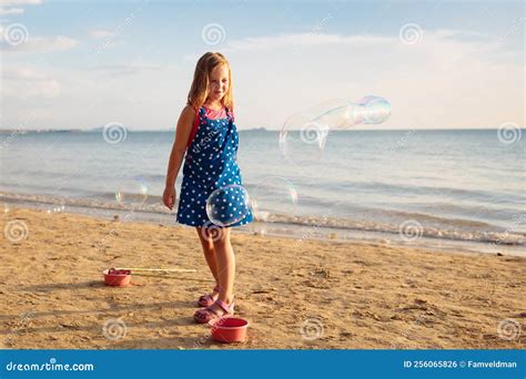 Kids Blow Bubble At Beach Child With Bubbles Stock Photo Image Of