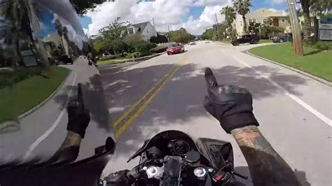 Vigilante Motorcyclist Records Moment He Chases Down Hit And Run Suspect After Car Crash In