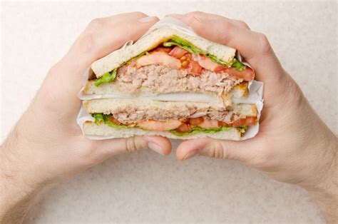 Premium Photo Wrapped Tuna Sandwiches With Lettuce Tomatoes And