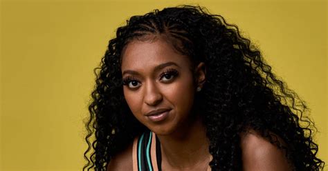 Didi Richards Nails Her Street Style In Baggy Low Rise Jeans String Bikini And Sporty Vintage