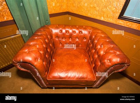Vintage Brown Leather Armchair Stock Photo Alamy