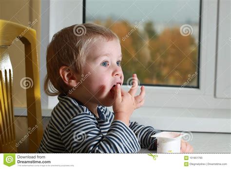 Funny Babe Blondes Licks Finger With Yogurt Stock Image Image Of Yogurt Baby