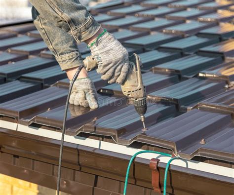 Installation of Metal Drain on the Roof of the House Stock Image ...