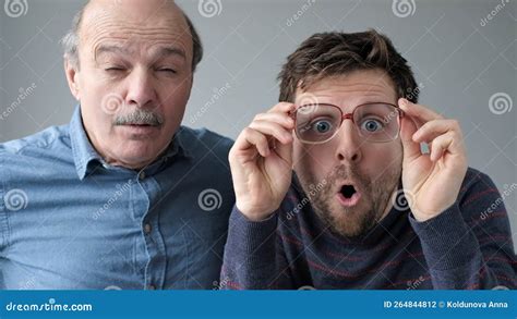 Surprised Stupefied Men Mature Father And Son In Big Glasses With Wow Expression Stock Photo