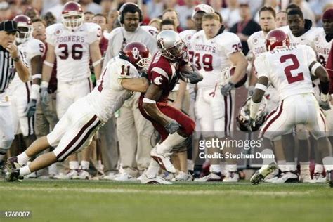 Linebacker Teddy Lehman of the University of Oklahoma Sooners shoves ...