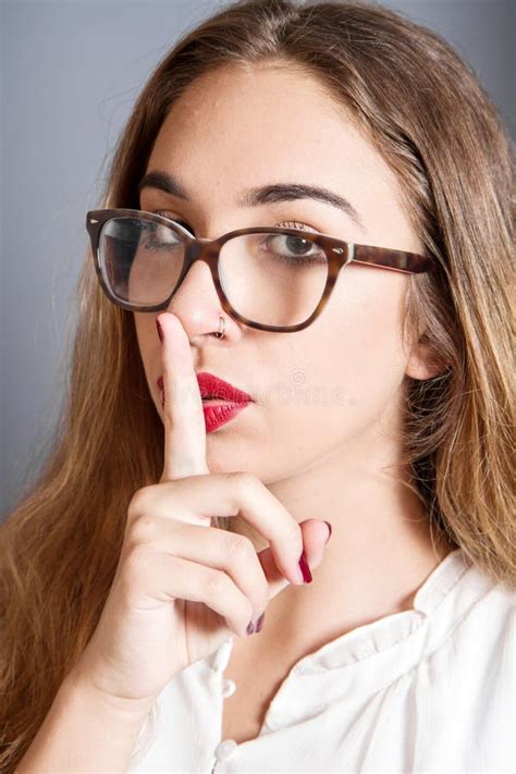 Brunette Girl With A Finger On Her Lips Showing To Keep Silence Hush Stock Image Image Of