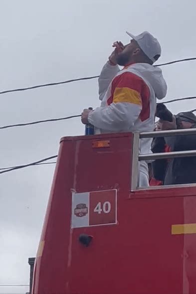 Travis Kelce catches and drinks Fireball during Super Bowl parade