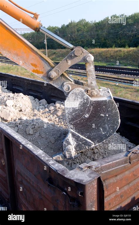 loader loads  wagon train stock photo alamy