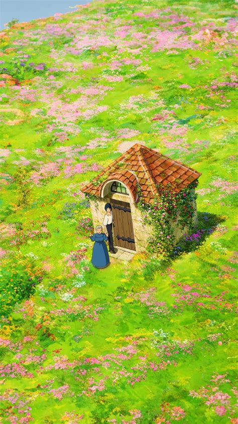 A Small House In The Middle Of A Lush Green Field With Flowers And