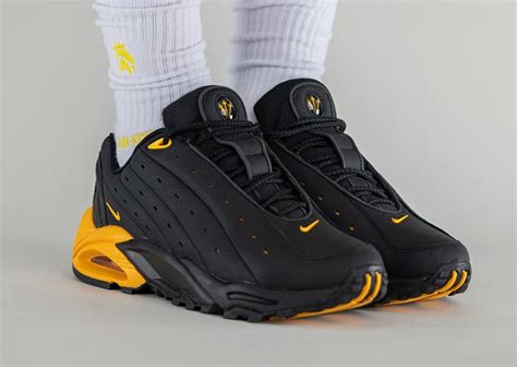 Detailed Looks At Drakes Nocta X Nike Hot Step Air Terra Black University Gold Sneaker News