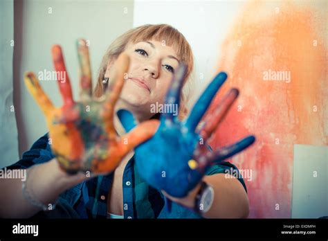 Beautiful Blonde Woman Painter In Her Studio Stock Photo Alamy