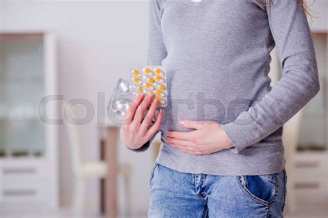 pregnant woman  pills  pregnancy stock image colourbox
