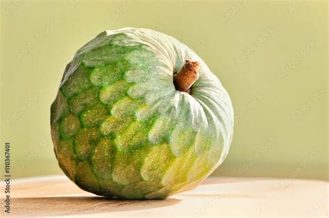 Exotic Fruit Cherimoya On Green Background Stock Photo Adobe Stock