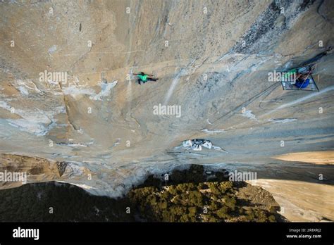 Man Climbing Dawn Wall Of El Capitan In Yosemite National Park Stock