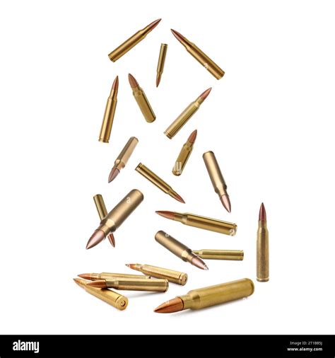 Many Bullets Falling On White Background Firearm Ammunition Stock