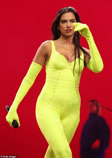 Dua Lipa Shows Off Her Incredible Figure In A Neon Yellow Catsuit