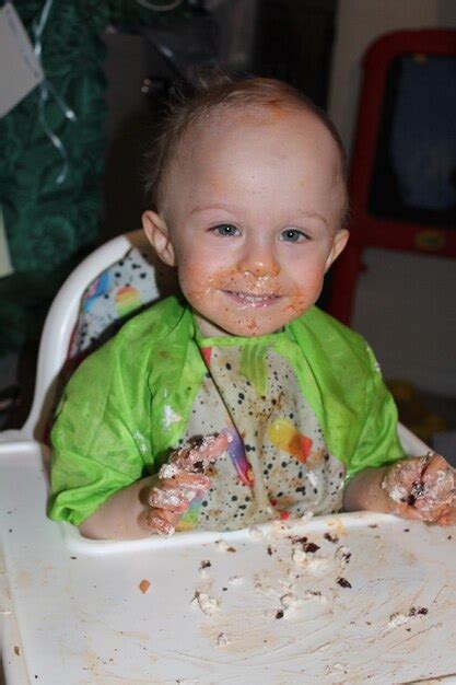 Premium Photo Portrait Of Cute Boy Eating Food