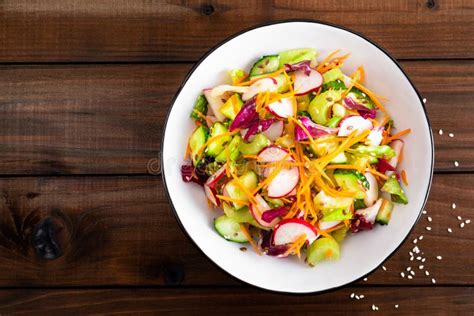 Healthy Vegetarian Vegetable Salad With Fresh Raw Radish Carrot