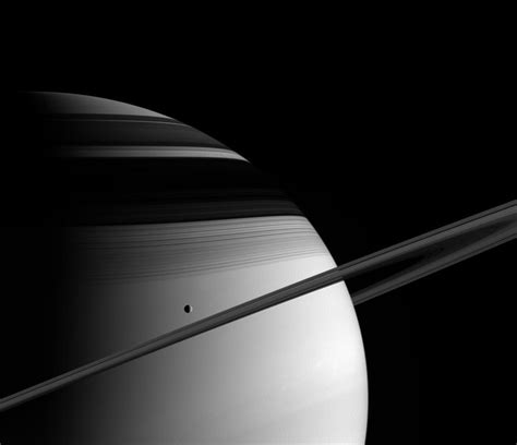 Tethys Glides Past Saturn Universe Today