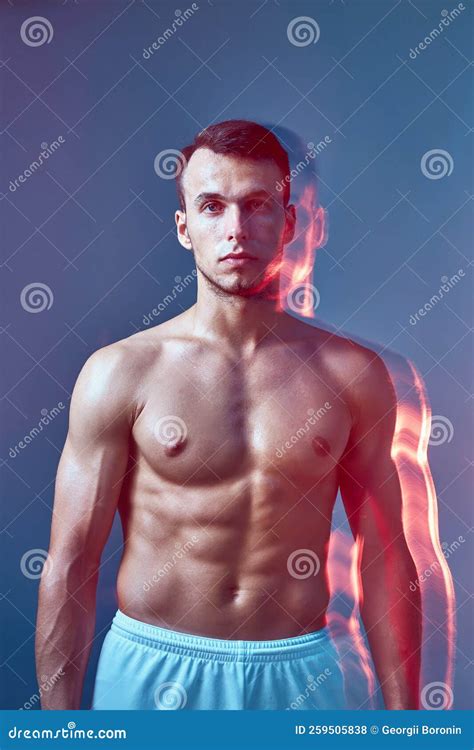 Muscular Adult Male Posing With Half Naked Body Strong Man Looking At The Camera Advertising