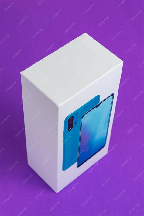 Белая коробка сотового телефона на фоне | Бесплатно Фото