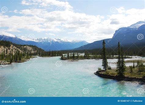 River from snow mountains stock image. Image of landscape - 5540147