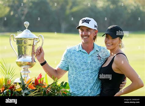 Jake Knapp, of the United States, and his girlfriend Makena White pose