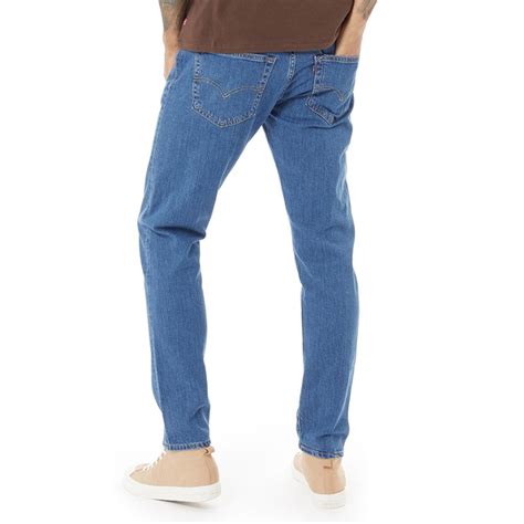 Levi S Herren Jeans In Karotten Stil Mittelblau