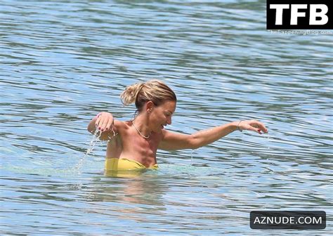 Carly Parker Sexy Seen Flaunting Her Hot Figure Wearing A Yellow Bikini On The Beach In Barbados